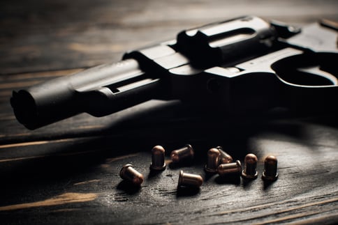 revolver-pistol-with-flobert-ammo-4mm-on-dark-wood-2023-11-27-05-11-36-utc